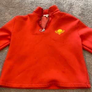 Red with orange flames on the sleeves